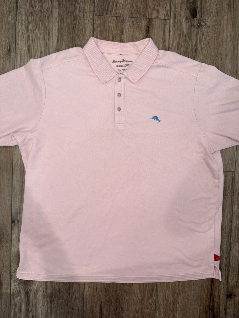 Tommy Bahama Light Pink Polo with Blue Dolphin Logo